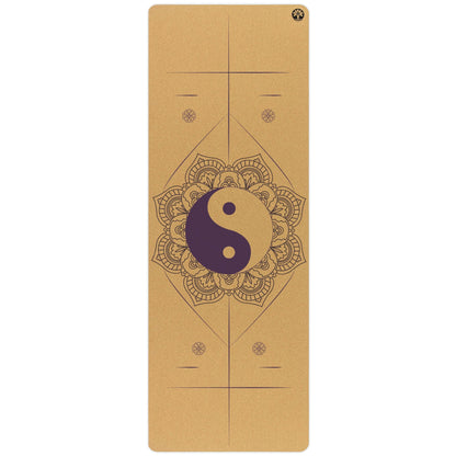 Yoga mat with yin yang symbol and mandala design on a white background